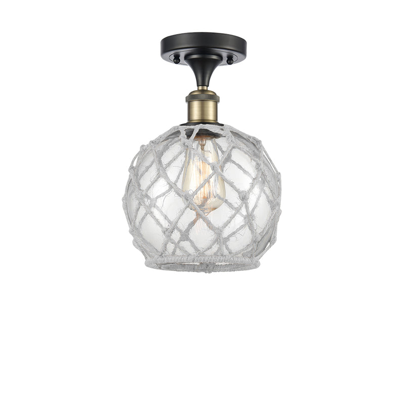 Farmhouse Rope Semi-Flush Mount shown in the Black Antique Brass finish with a Clear Glass with White Rope shade