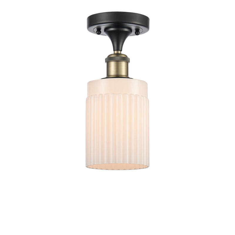Hadley Semi-Flush Mount shown in the Black Antique Brass finish with a Matte White shade