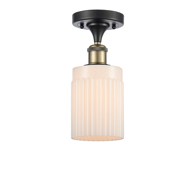 Hadley Semi-Flush Mount shown in the Black Antique Brass finish with a Matte White shade
