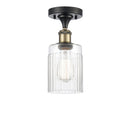 Hadley Semi-Flush Mount shown in the Black Antique Brass finish with a Clear shade