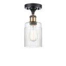 Hadley Semi-Flush Mount shown in the Black Antique Brass finish with a Clear shade