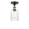 Hadley Semi-Flush Mount shown in the Black Antique Brass finish with a Clear shade