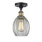 Eaton Semi-Flush Mount shown in the Black Antique Brass finish with a Clear shade