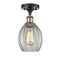 Eaton Semi-Flush Mount shown in the Black Antique Brass finish with a Clear shade