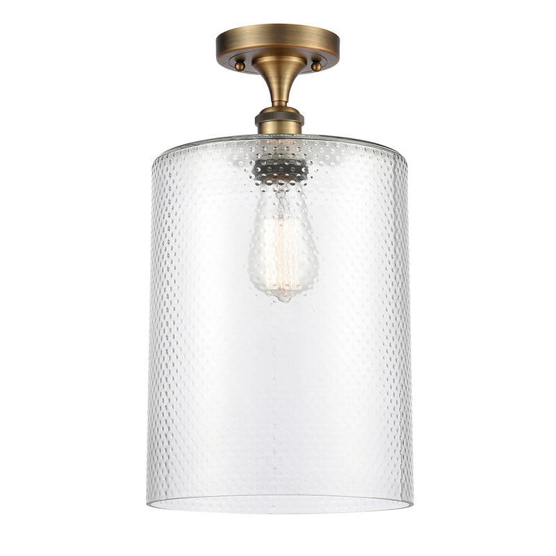 Cobbleskill Semi-Flush Mount shown in the Brushed Brass finish with a Clear shade