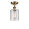 Cobbleskill Semi-Flush Mount shown in the Brushed Brass finish with a Clear shade