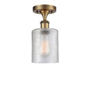 Cobbleskill Semi-Flush Mount shown in the Brushed Brass finish with a Clear shade