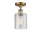 Cobbleskill Semi-Flush Mount shown in the Brushed Brass finish with a Clear shade