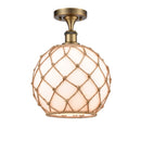 Farmhouse Rope Semi-Flush Mount shown in the Brushed Brass finish with a White Glass with Brown Rope shade