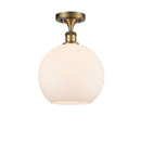 Athens Semi-Flush Mount shown in the Brushed Brass finish with a Matte White shade