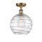 Deco Swirl Semi-Flush Mount shown in the Brushed Brass finish with a Clear shade