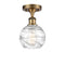 Deco Swirl Semi-Flush Mount shown in the Brushed Brass finish with a Clear shade