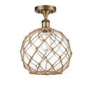 Farmhouse Rope Semi-Flush Mount shown in the Brushed Brass finish with a Clear Glass with Brown Rope shade