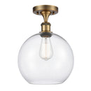 Athens Semi-Flush Mount shown in the Brushed Brass finish with a Clear shade