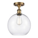 Athens Semi-Flush Mount shown in the Brushed Brass finish with a Clear shade