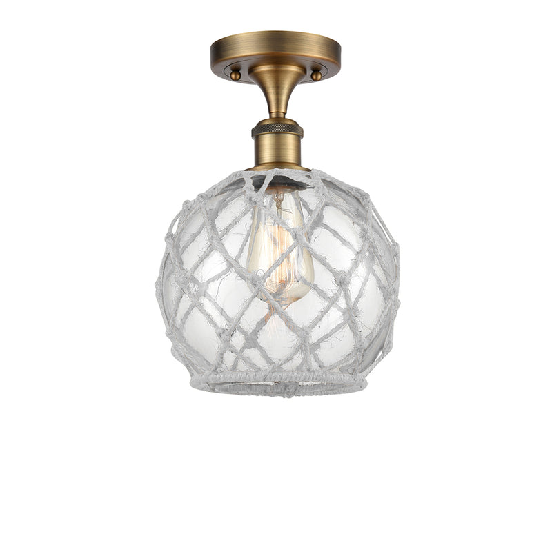 Farmhouse Rope Semi-Flush Mount shown in the Brushed Brass finish with a Clear Glass with White Rope shade