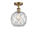 Farmhouse Rope Semi-Flush Mount shown in the Brushed Brass finish with a Clear Glass with White Rope shade