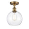 Athens Semi-Flush Mount shown in the Brushed Brass finish with a Clear shade