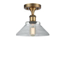 Orwell Semi-Flush Mount shown in the Brushed Brass finish with a Clear shade