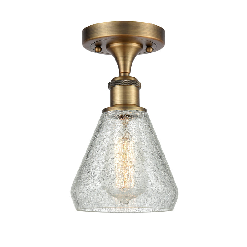 Conesus Semi-Flush Mount shown in the Brushed Brass finish with a Clear Crackle shade