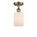Hadley Semi-Flush Mount shown in the Brushed Brass finish with a Matte White shade