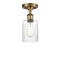 Hadley Semi-Flush Mount shown in the Brushed Brass finish with a Clear shade