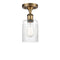 Hadley Semi-Flush Mount shown in the Brushed Brass finish with a Clear shade