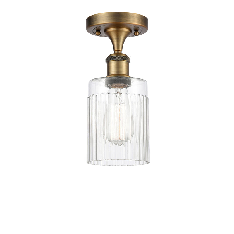 Hadley Semi-Flush Mount shown in the Brushed Brass finish with a Clear shade