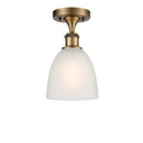 Castile Semi-Flush Mount shown in the Brushed Brass finish with a White shade