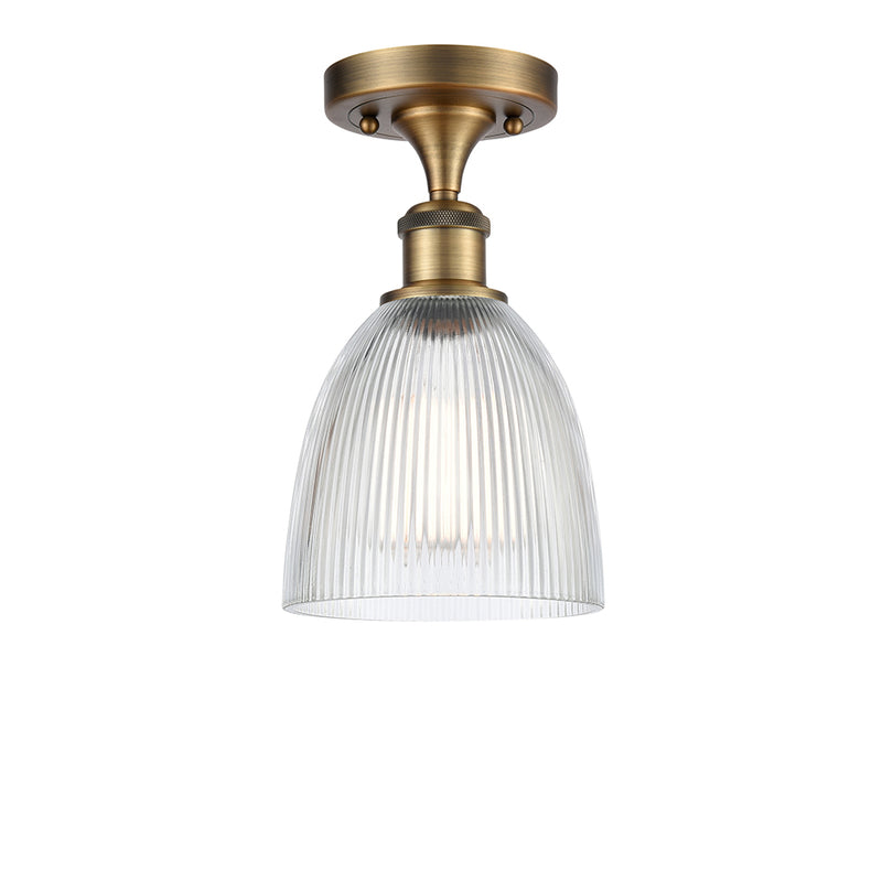 Castile Semi-Flush Mount shown in the Brushed Brass finish with a Clear shade