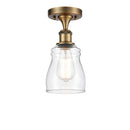 Ellery Semi-Flush Mount shown in the Brushed Brass finish with a Clear shade