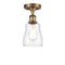 Ellery Semi-Flush Mount shown in the Brushed Brass finish with a Clear shade