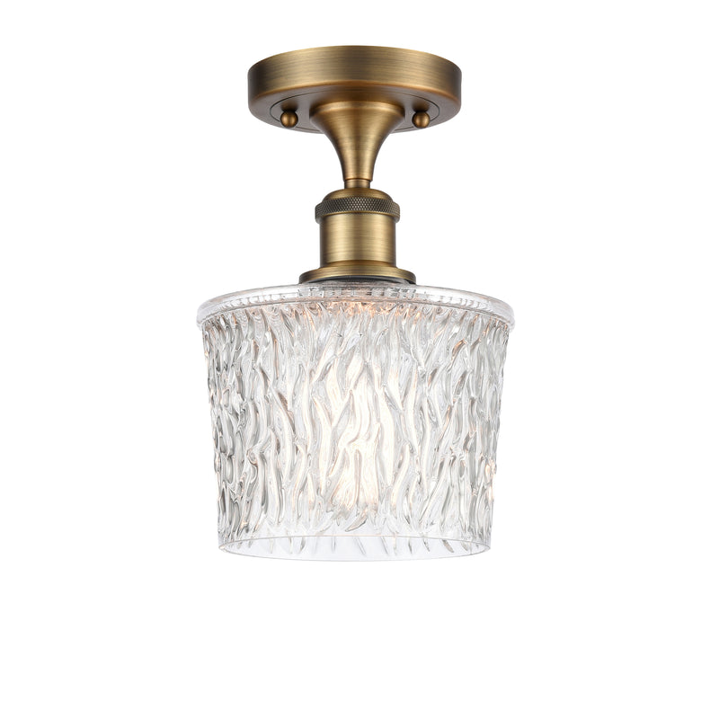 Niagra Semi-Flush Mount shown in the Brushed Brass finish with a Clear shade