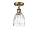 Brookfield Semi-Flush Mount shown in the Brushed Brass finish with a Clear shade