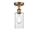 Clymer Semi-Flush Mount shown in the Brushed Brass finish with a Clear shade