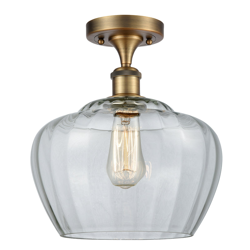 Fenton Semi-Flush Mount shown in the Brushed Brass finish with a Clear shade