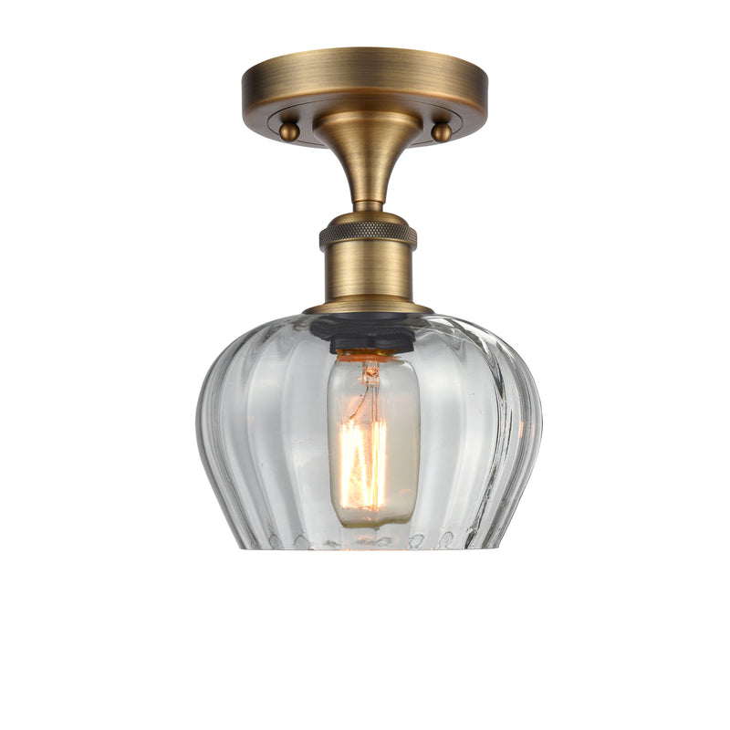 Fenton Semi-Flush Mount shown in the Brushed Brass finish with a Clear shade