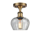 Fenton Semi-Flush Mount shown in the Brushed Brass finish with a Clear shade