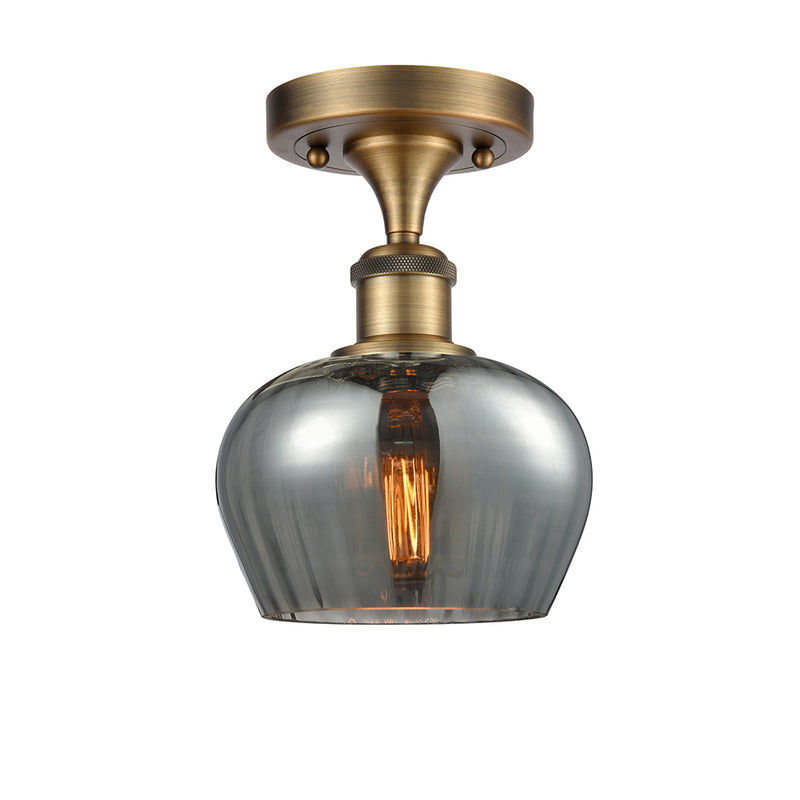 Fenton Semi-Flush Mount shown in the Brushed Brass finish with a Plated Smoke shade