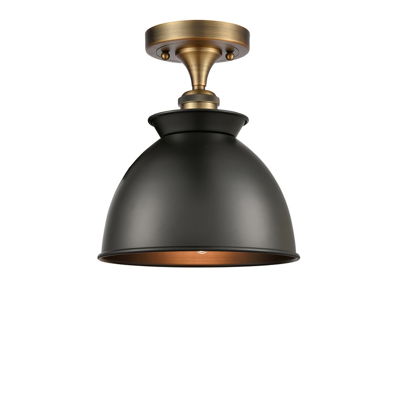 Adirondack Semi-Flush Mount shown in the Brushed Brass finish with a Matte Black shade