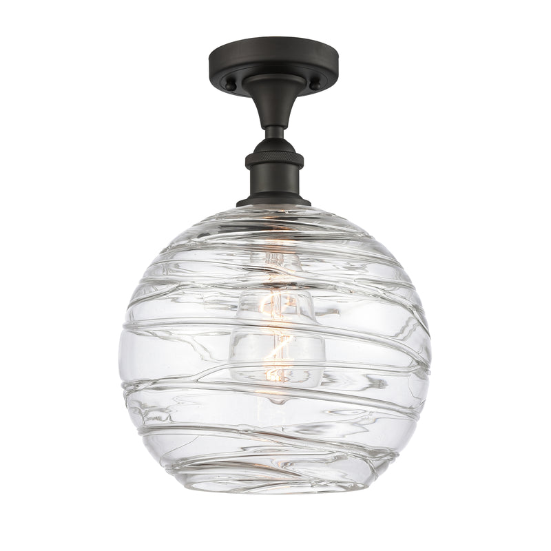 Deco Swirl Semi-Flush Mount shown in the Oil Rubbed Bronze finish with a Clear shade