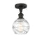 Deco Swirl Semi-Flush Mount shown in the Oil Rubbed Bronze finish with a Clear shade