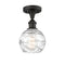 Deco Swirl Semi-Flush Mount shown in the Oil Rubbed Bronze finish with a Clear shade