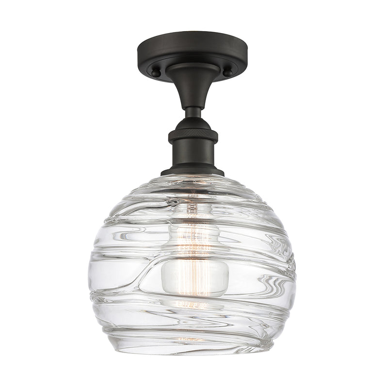 Deco Swirl Semi-Flush Mount shown in the Oil Rubbed Bronze finish with a Clear shade