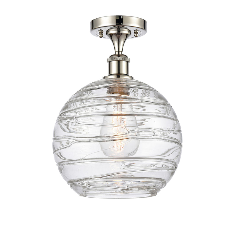 Deco Swirl Semi-Flush Mount shown in the Polished Nickel finish with a Clear shade