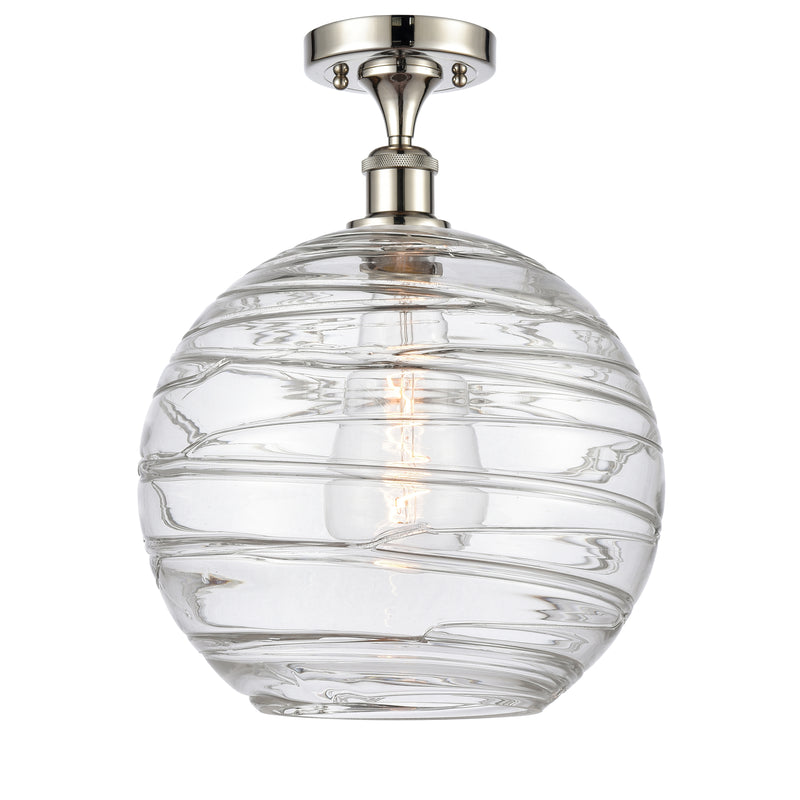 Deco Swirl Semi-Flush Mount shown in the Polished Nickel finish with a Clear shade