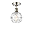 Deco Swirl Semi-Flush Mount shown in the Polished Nickel finish with a Clear shade