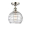 Deco Swirl Semi-Flush Mount shown in the Polished Nickel finish with a Clear shade