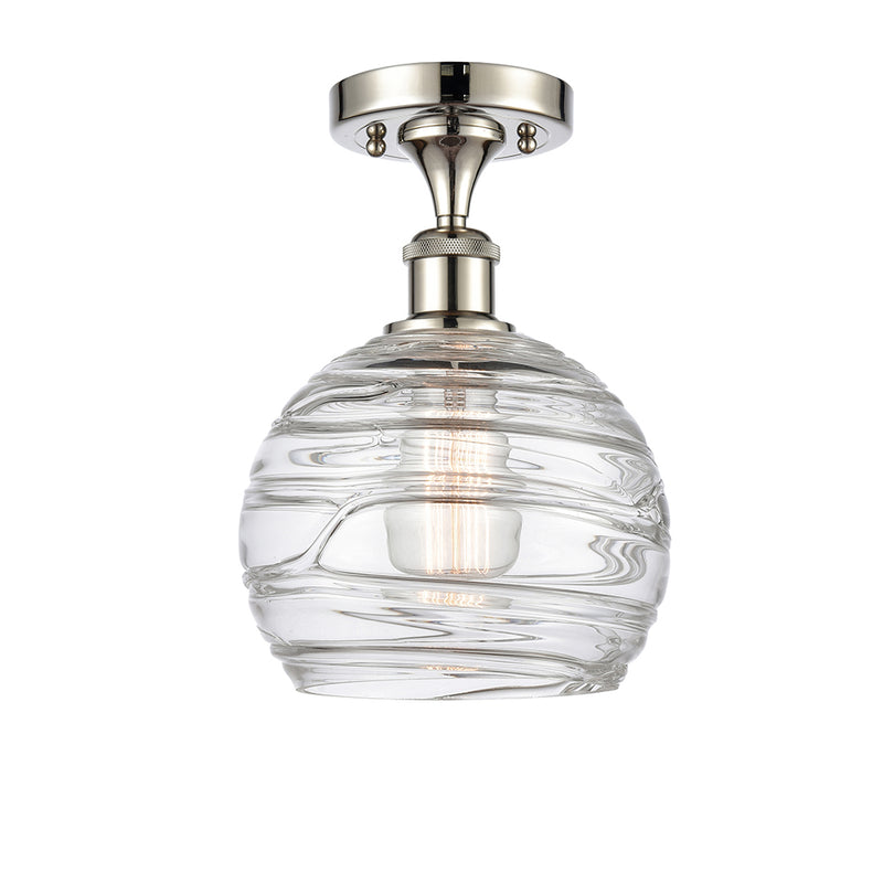 Deco Swirl Semi-Flush Mount shown in the Polished Nickel finish with a Clear shade