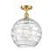 Deco Swirl Semi-Flush Mount shown in the Satin Gold finish with a Clear shade